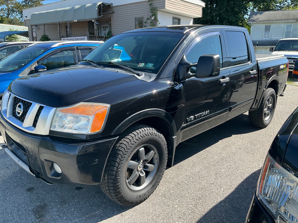 Black 2013 Nissan Titan Pickup Truck Four-Wheel Drive Automatic